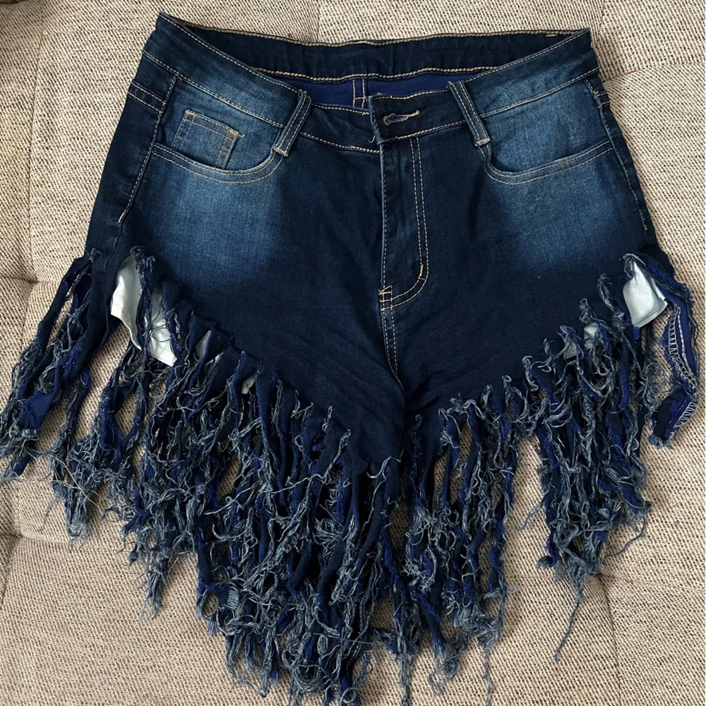 Dark denim fringed jean shorts